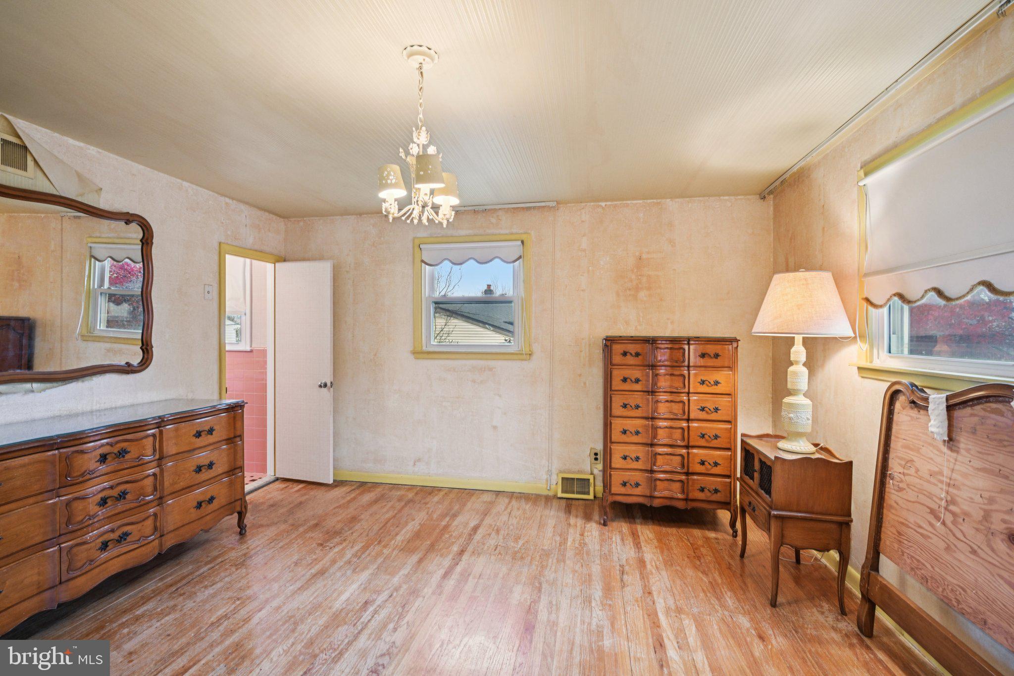 9227 Burbank Road Philadelphia, PA 19115 - Photo 26 of 46 a view of livingroom with furniture and chandelier