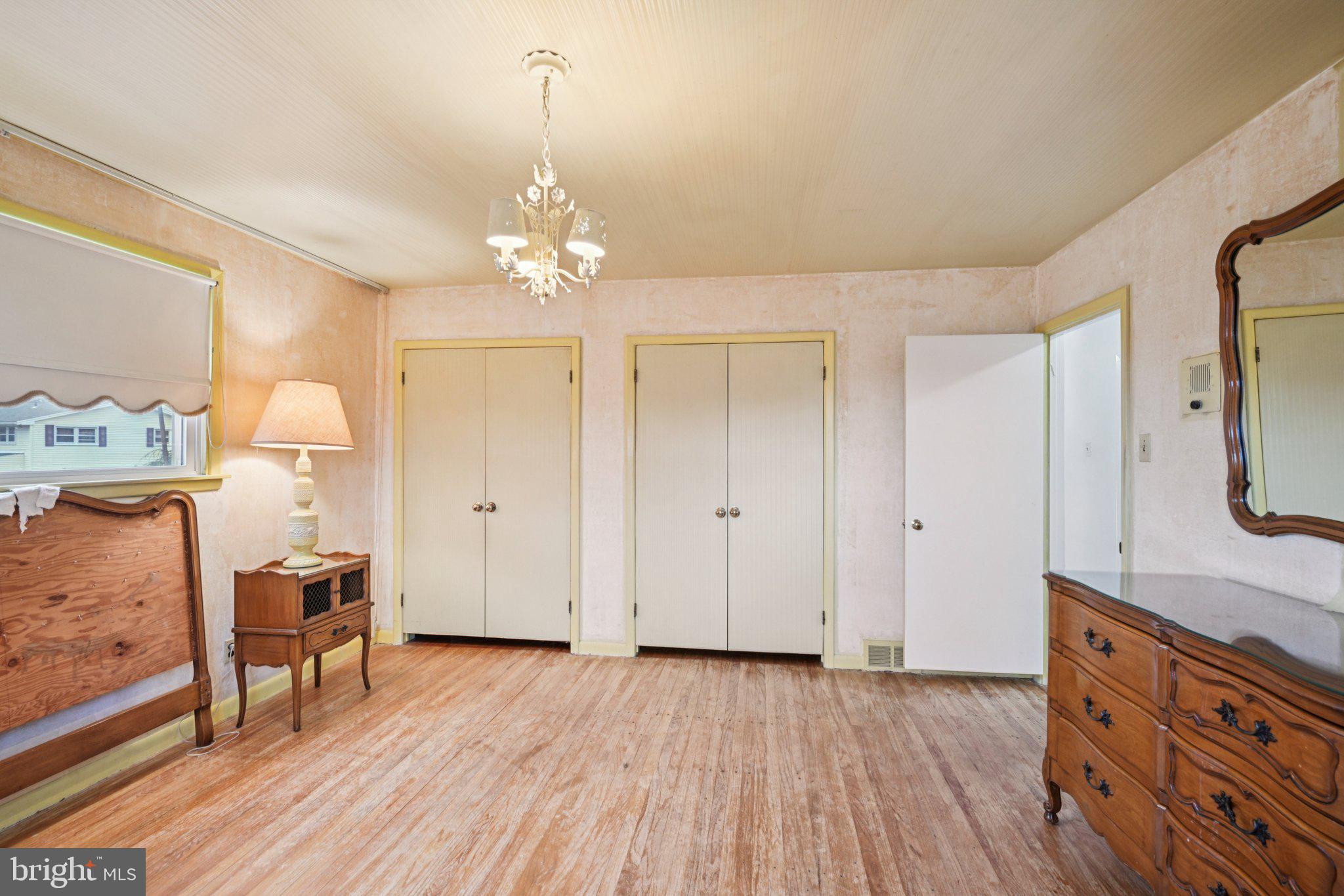 9227 Burbank Road Philadelphia, PA 19115 - Photo 28 of 46 a living room with furniture and a chandelier
