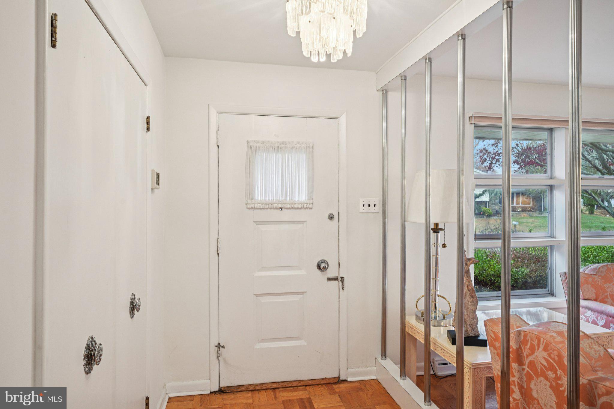 9227 Burbank Road Philadelphia, PA 19115 - Photo 5 of 46 a view of front door with wooden floor