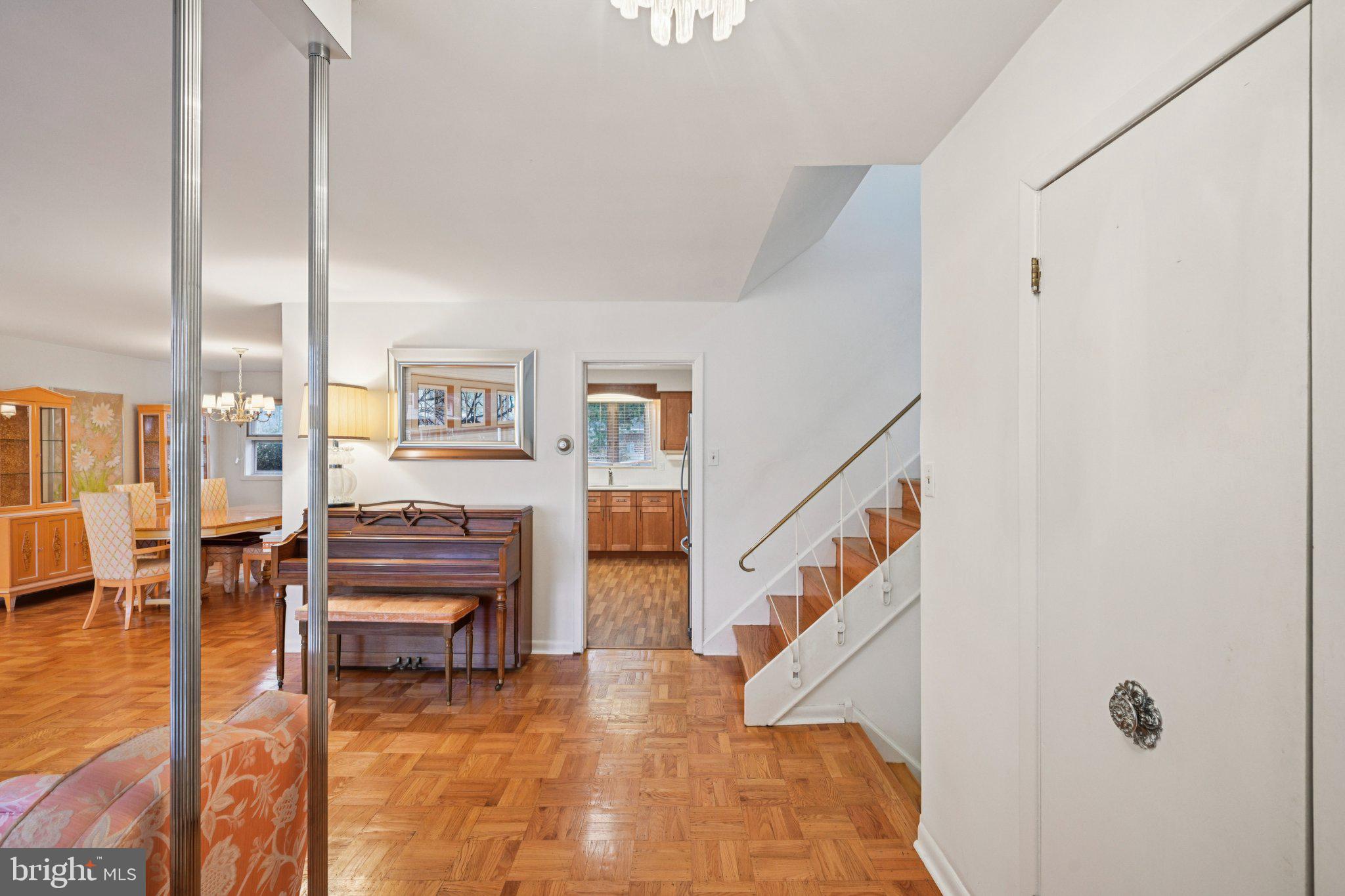 9227 Burbank Road Philadelphia, PA 19115 - Photo 6 of 46 a view of a livingroom with furniture and a rug