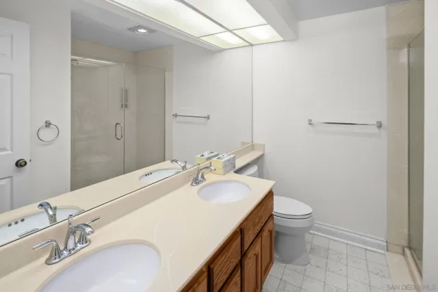 a bathroom with a sink toilet and tub