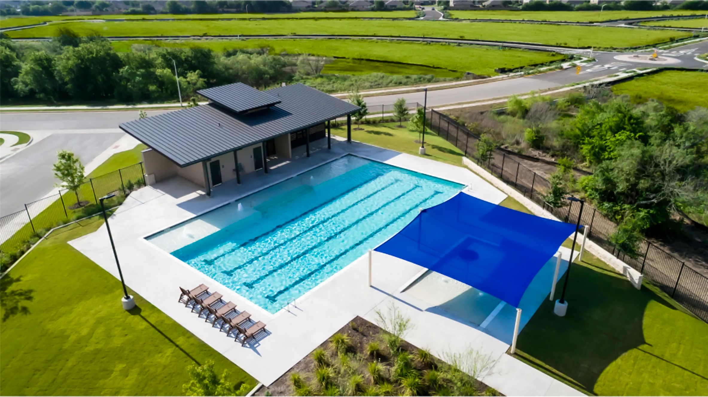 147 Otter Road Kyle, TX 78640 - Photo 34 of 34 Large community pool and play area close by