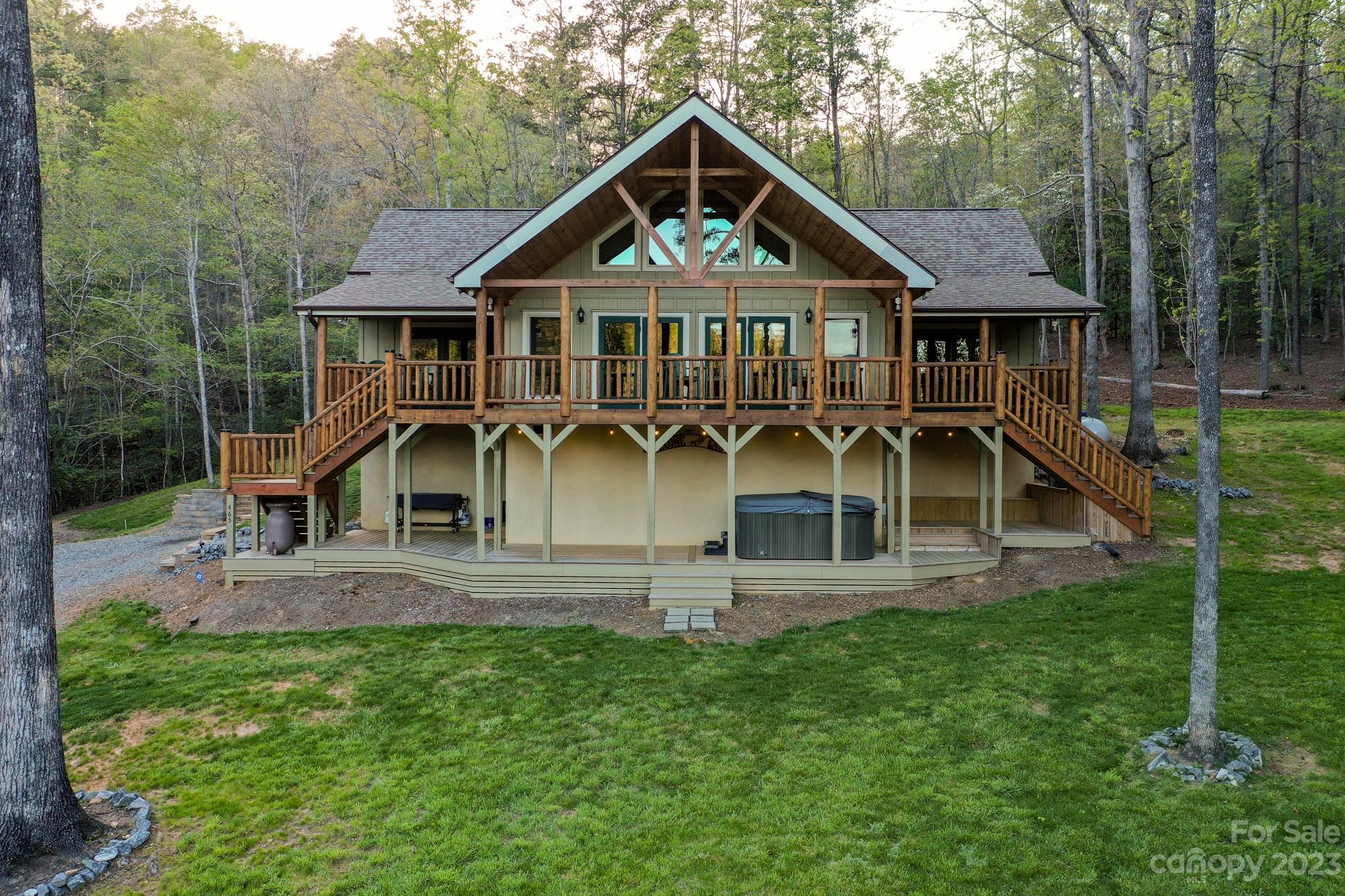 465 Calhoun Trail Rutherfordton, NC 28139 - Photo 1 of 48 a front view of a house with garden