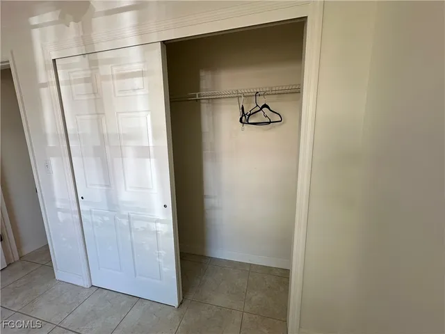 a bathroom with a glass door shower