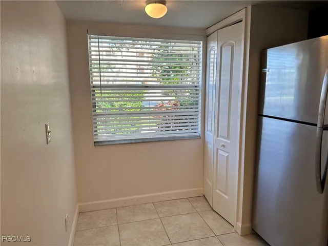 a view of kitchen with windows