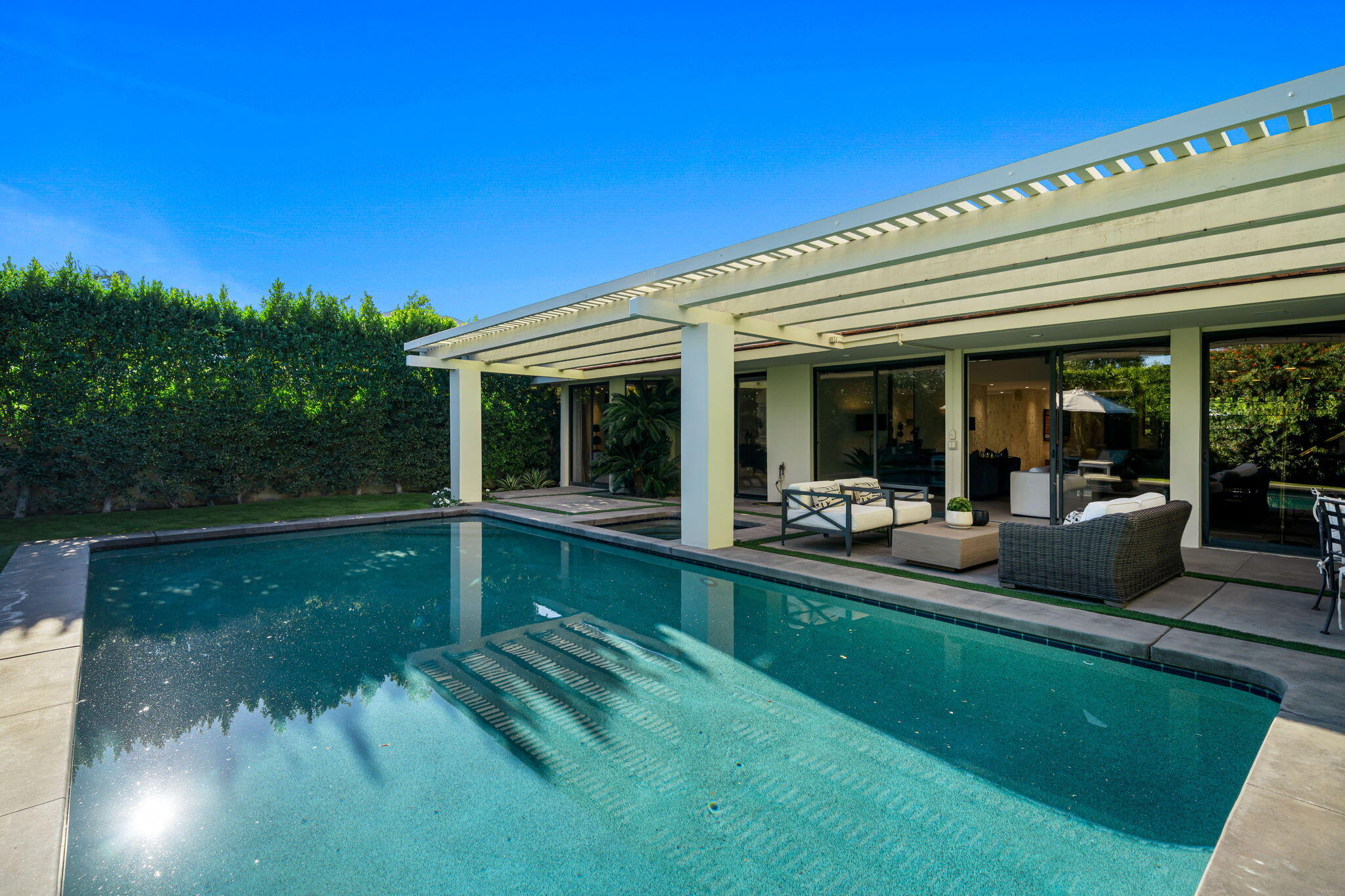 6 Exeter Court Rancho Mirage, CA 92270 - Photo 31 of 54 a view of a swimming pool with a patio