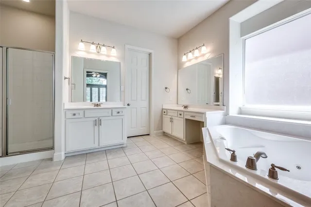 a bathroom with a sink a vanity and a mirror