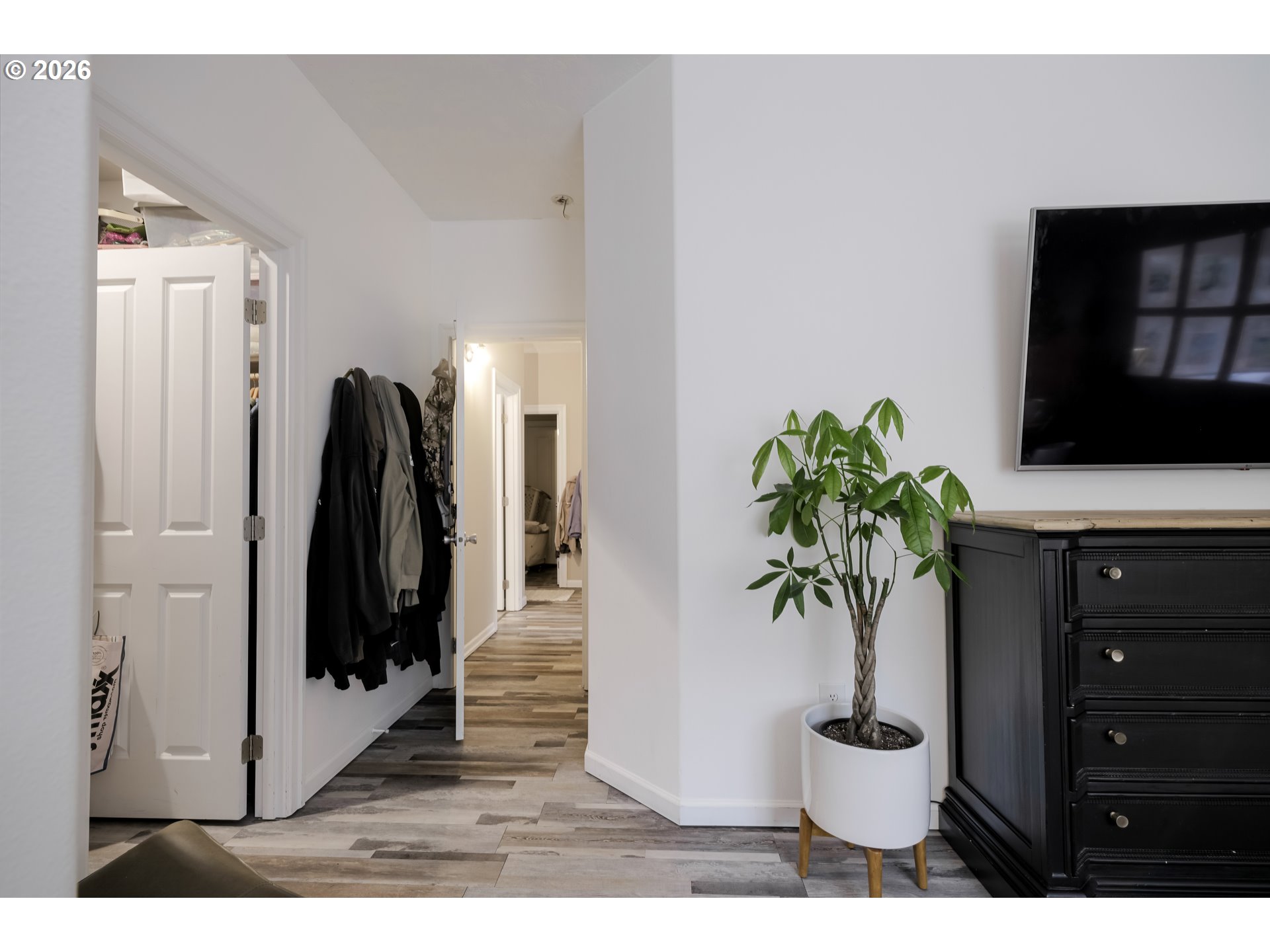 1732 Southeast 3rd Street Astoria, OR 97103 - Photo 21 of 30 a vase of flowers sitting on a table in front of a window