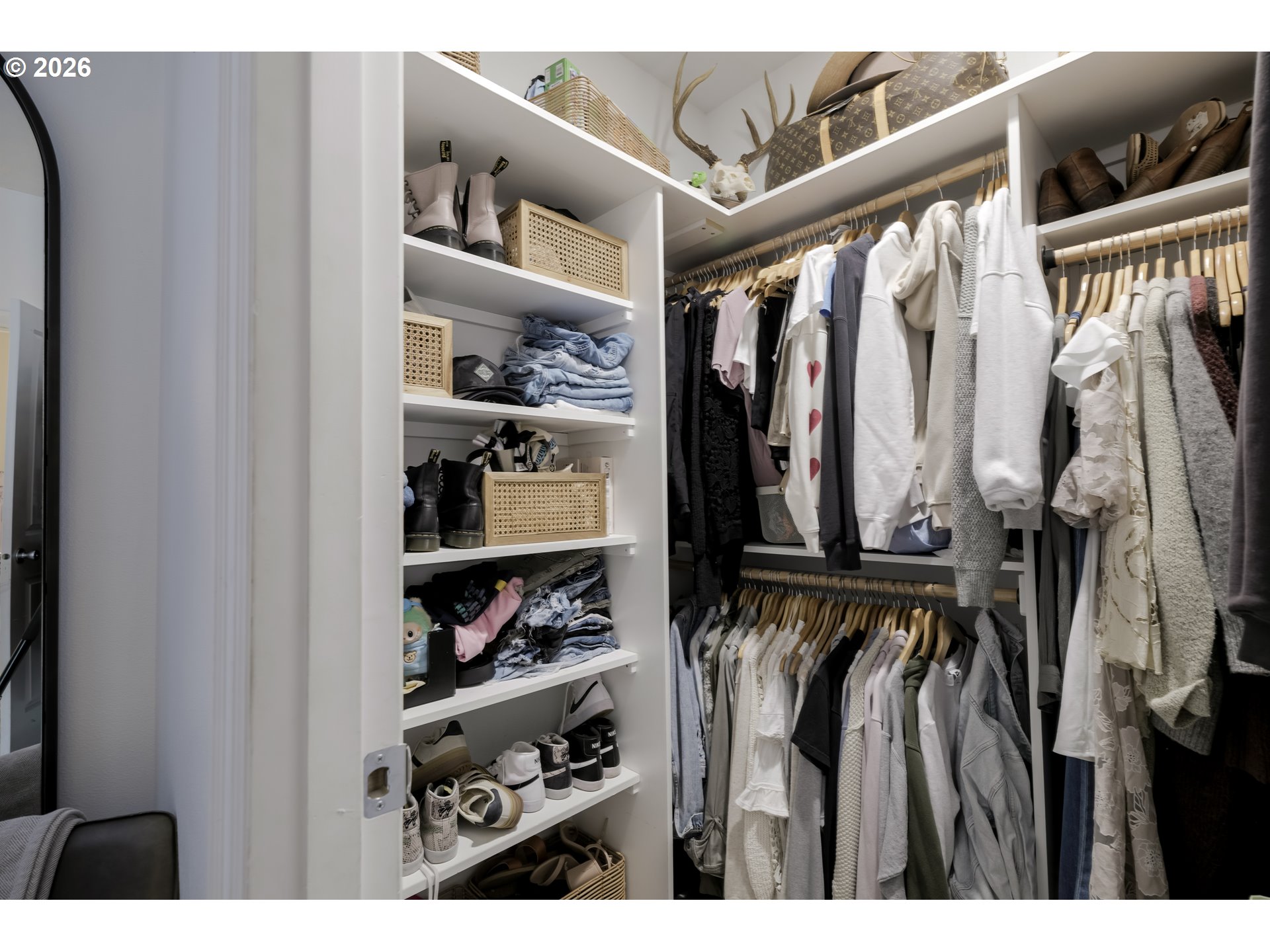 1732 Southeast 3rd Street Astoria, OR 97103 - Photo 24 of 30 a view of walk in closet with clothes and shoes