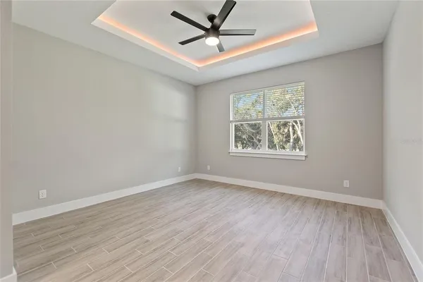 a bathroom with a toilet sink and shower