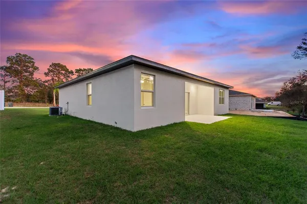 a house with garden in front of it