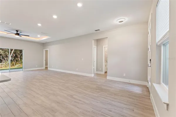 a view of a livingroom with a hardwood floor