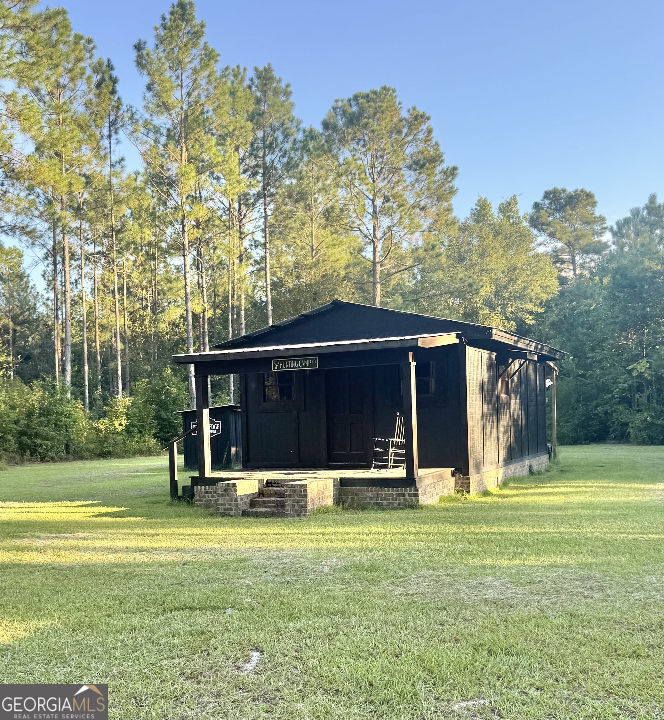 1603 Dl Durrence Road Reidsville, GA 30453 - Photo 6 of 78 a view of a house with a yard