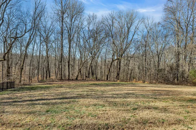a view of swimming pool with an outdoor seating