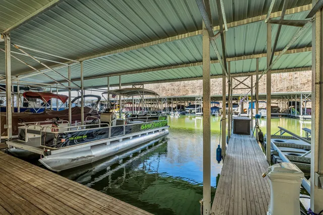 a view of swimming pool with outdoor seating