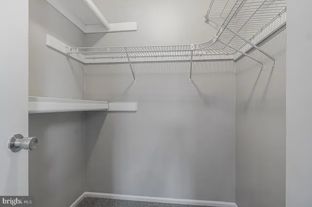 a view of a room with racks on the wall