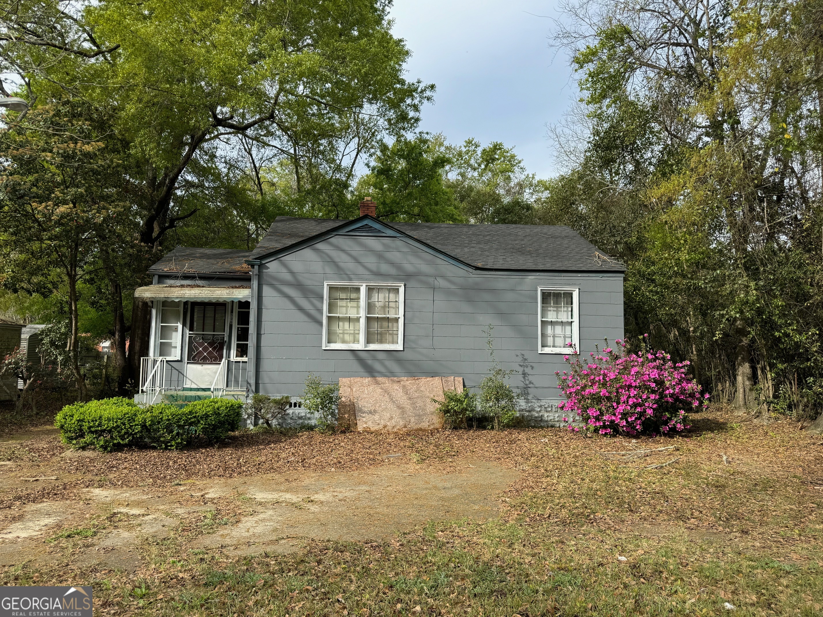 906 Central Avenue Dublin, GA 31021 - Photo 15 of 15 a front view of a house with a yard
