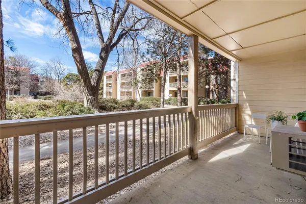 a view of a porch with furniture