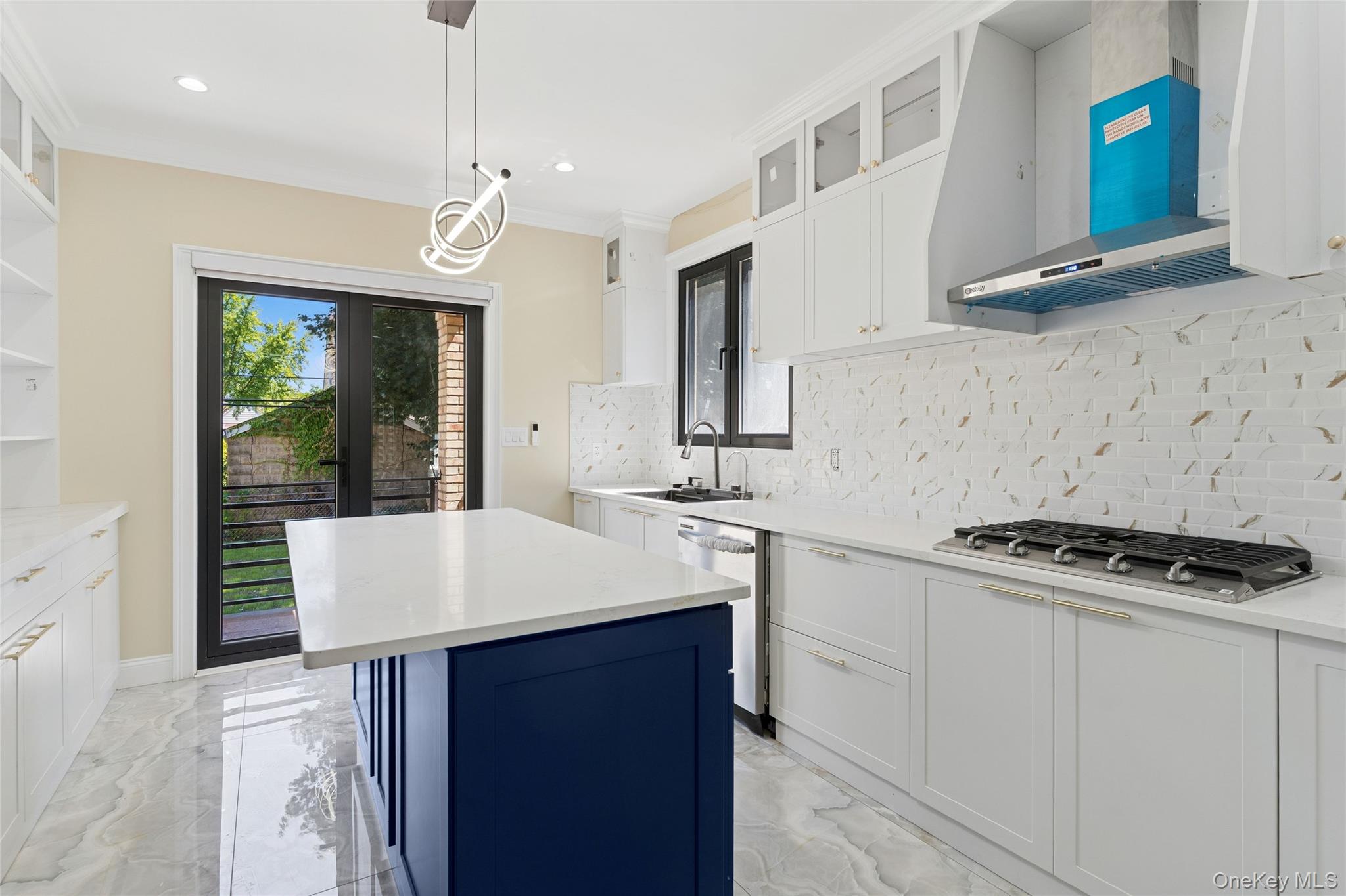 81-25 265th Street Queens, NY 11004 - Photo 16 of 44 Kitchen Island, Gas Cooktop