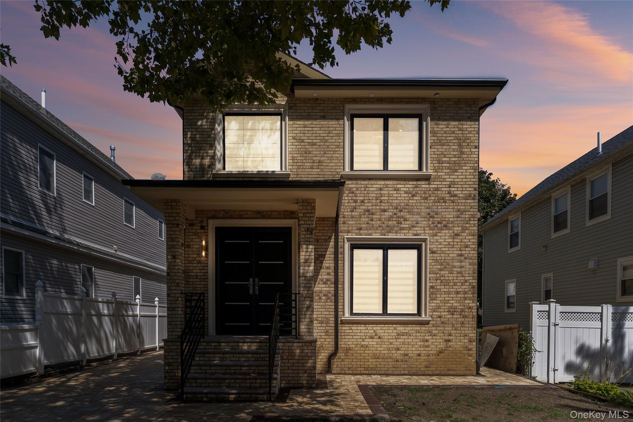 81-25 265th Street Queens, NY 11004 - Photo 5 of 44 View of front of property with brick siding