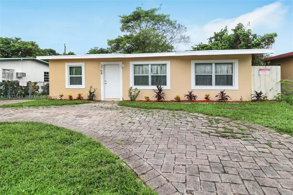 front view of a house with a patio