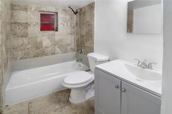 a bathroom with a sink and a toilet