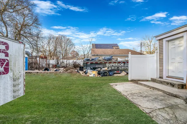 a view of a back yard of the house