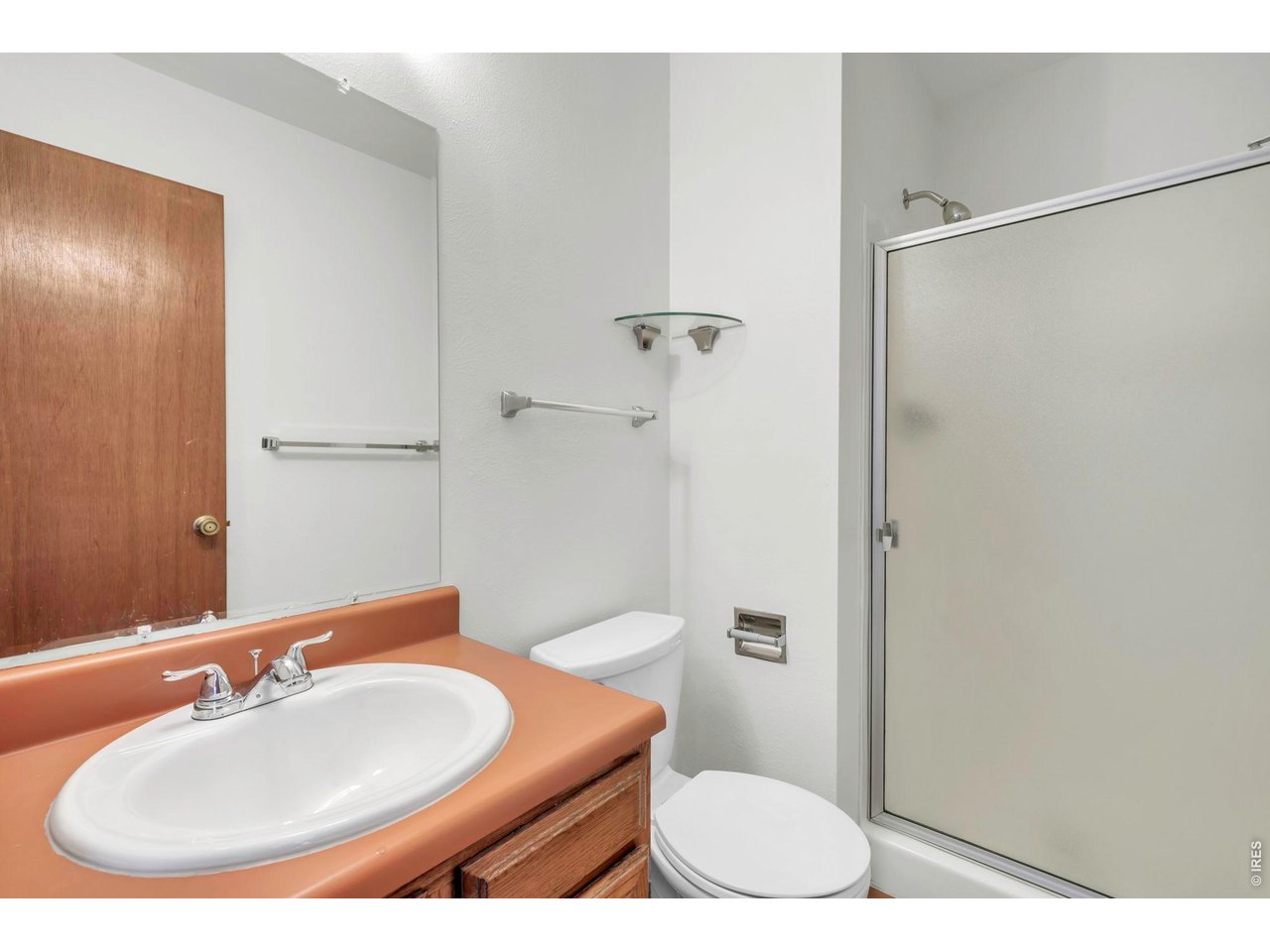 4268 Corriente Place Boulder, CO 80301 - Photo 15 of 35 a bathroom with a sink toilet and shower