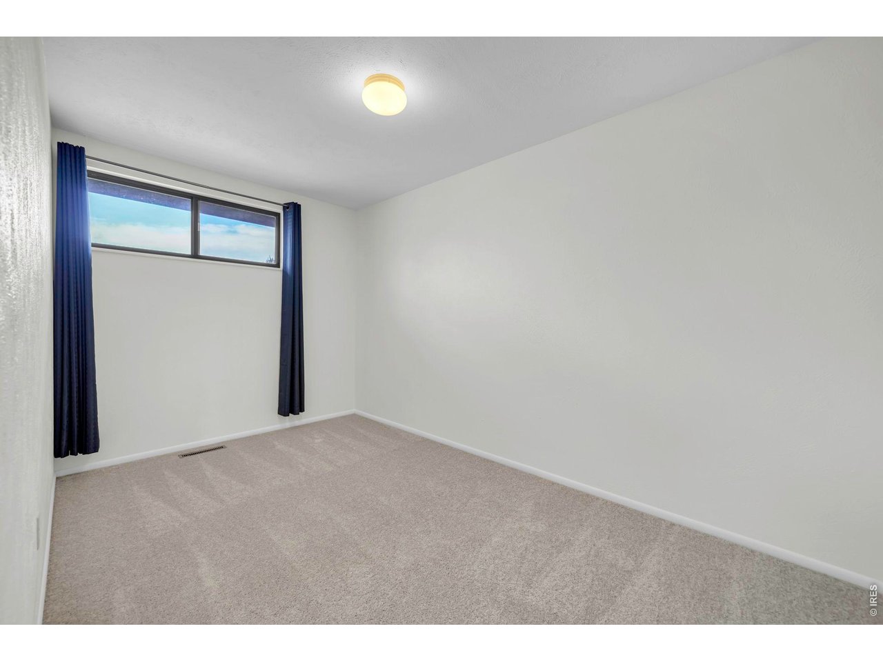 4268 Corriente Place Boulder, CO 80301 - Photo 23 of 35 a view of an empty room and window