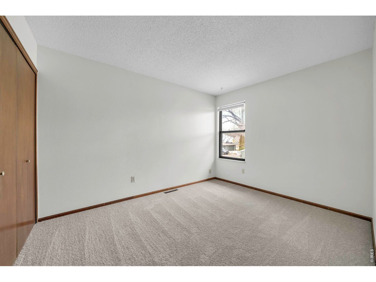 4268 Corriente Place Boulder, CO 80301 - Photo 25 of 35 a view of an empty room with a window
