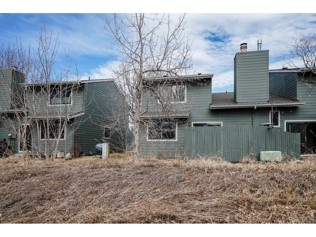 4268 Corriente Place Boulder, CO 80301 - Photo 27 of 35 a view of a house with wooden fence