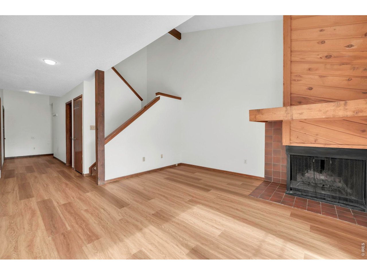 4268 Corriente Place Boulder, CO 80301 - Photo 4 of 35 a view of empty room with wooden floor