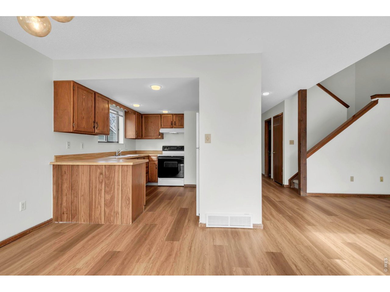 4268 Corriente Place Boulder, CO 80301 - Photo 8 of 35 a view of kitchen with wooden floor