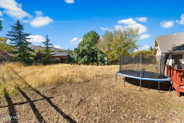 a view of outdoor space and yard