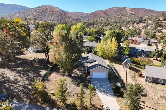a view of a house with a mountain