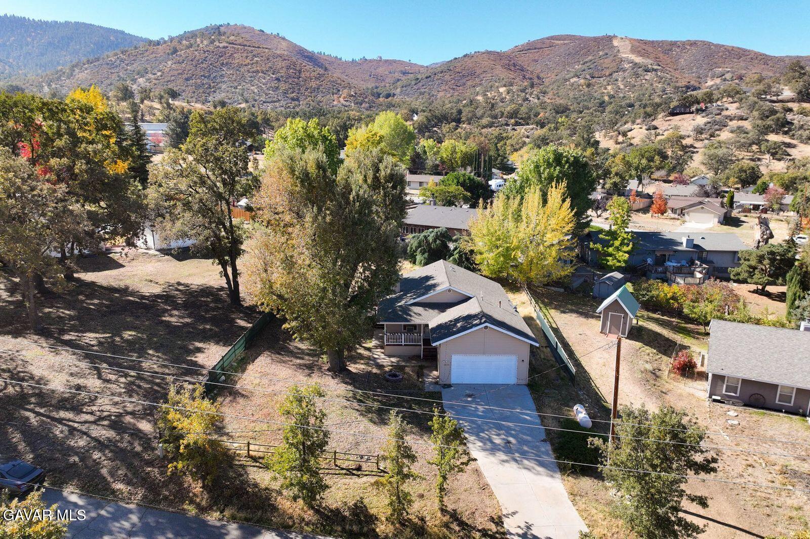 18330 Basil Drive Tehachapi, CA 93561 - Photo 40 of 47 a view of a house with a mountain