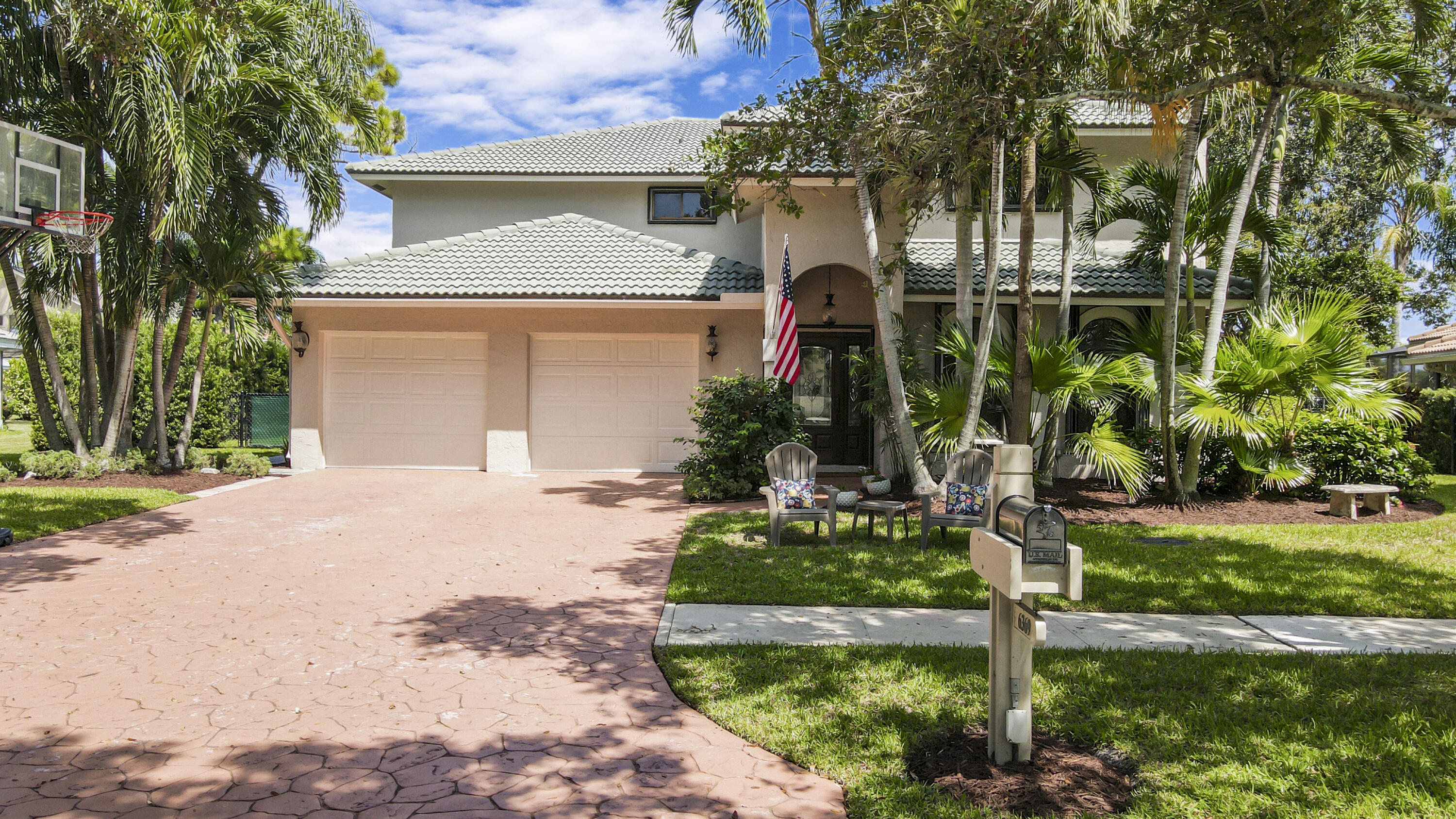 front view of a house with a small yard