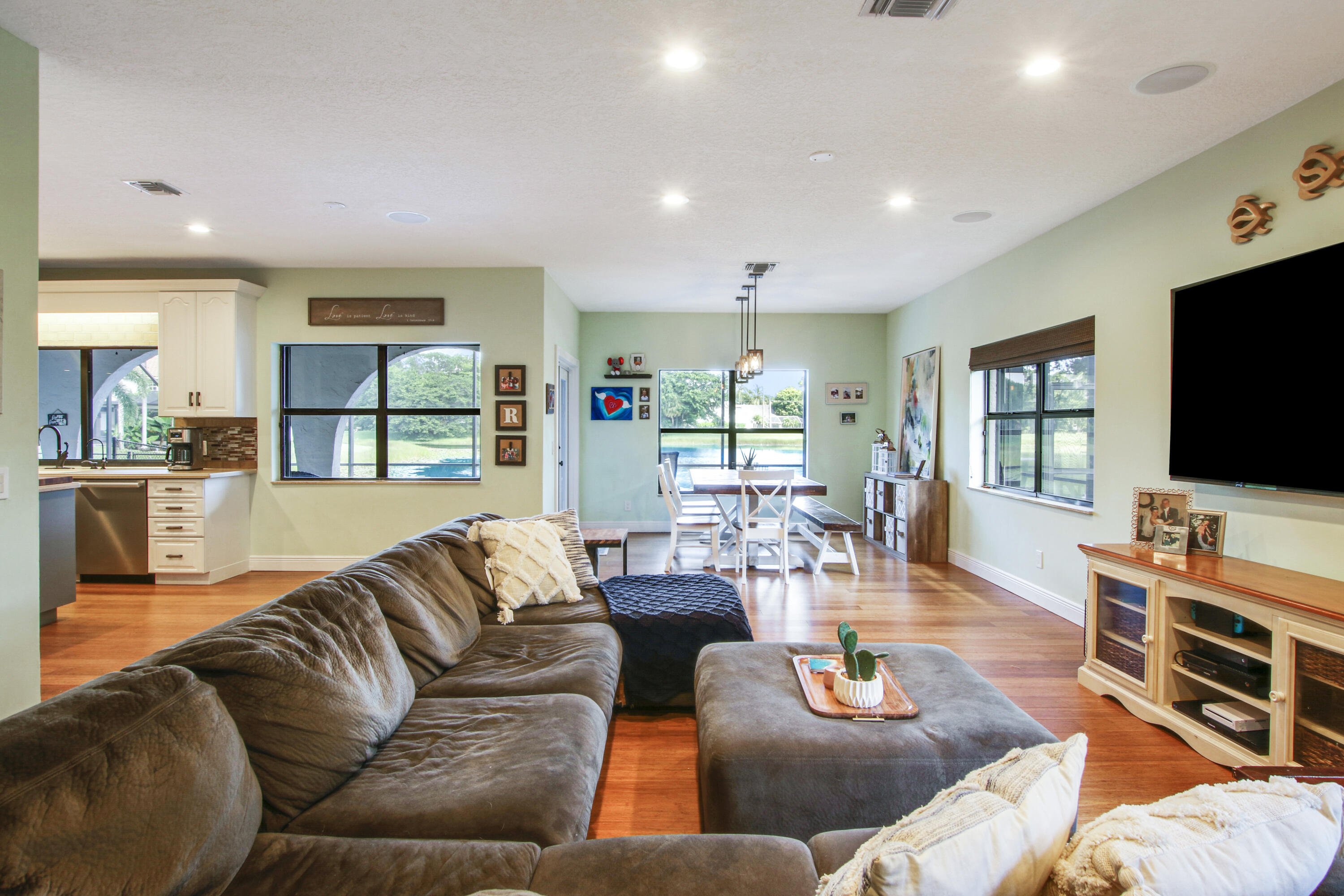 6369 Longleaf Pine Drive Jupiter, FL 33458 - Photo 23 of 53 a living room with furniture and a flat screen tv