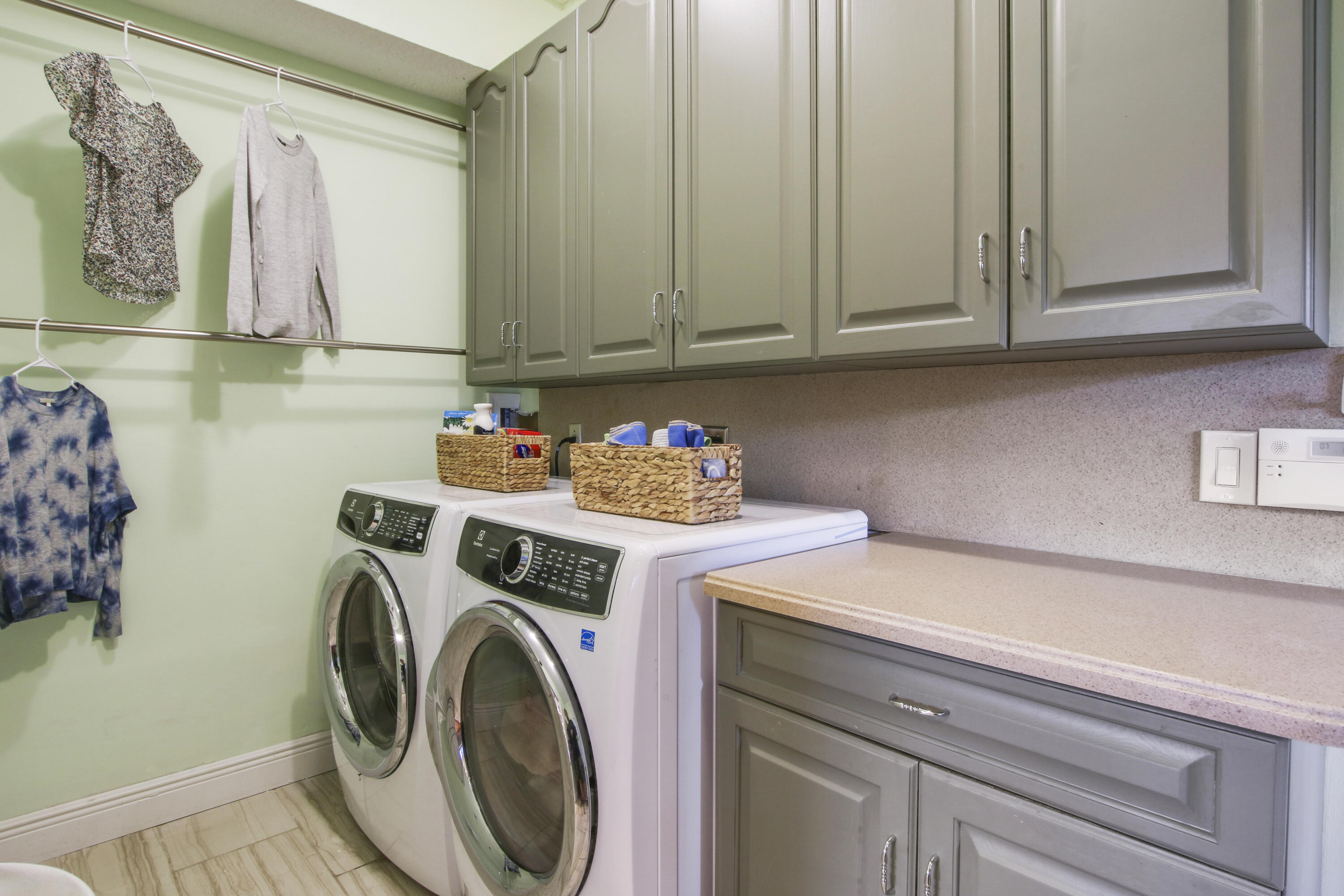 6369 Longleaf Pine Drive Jupiter, FL 33458 - Photo 27 of 53 a utility room with dryer and washer