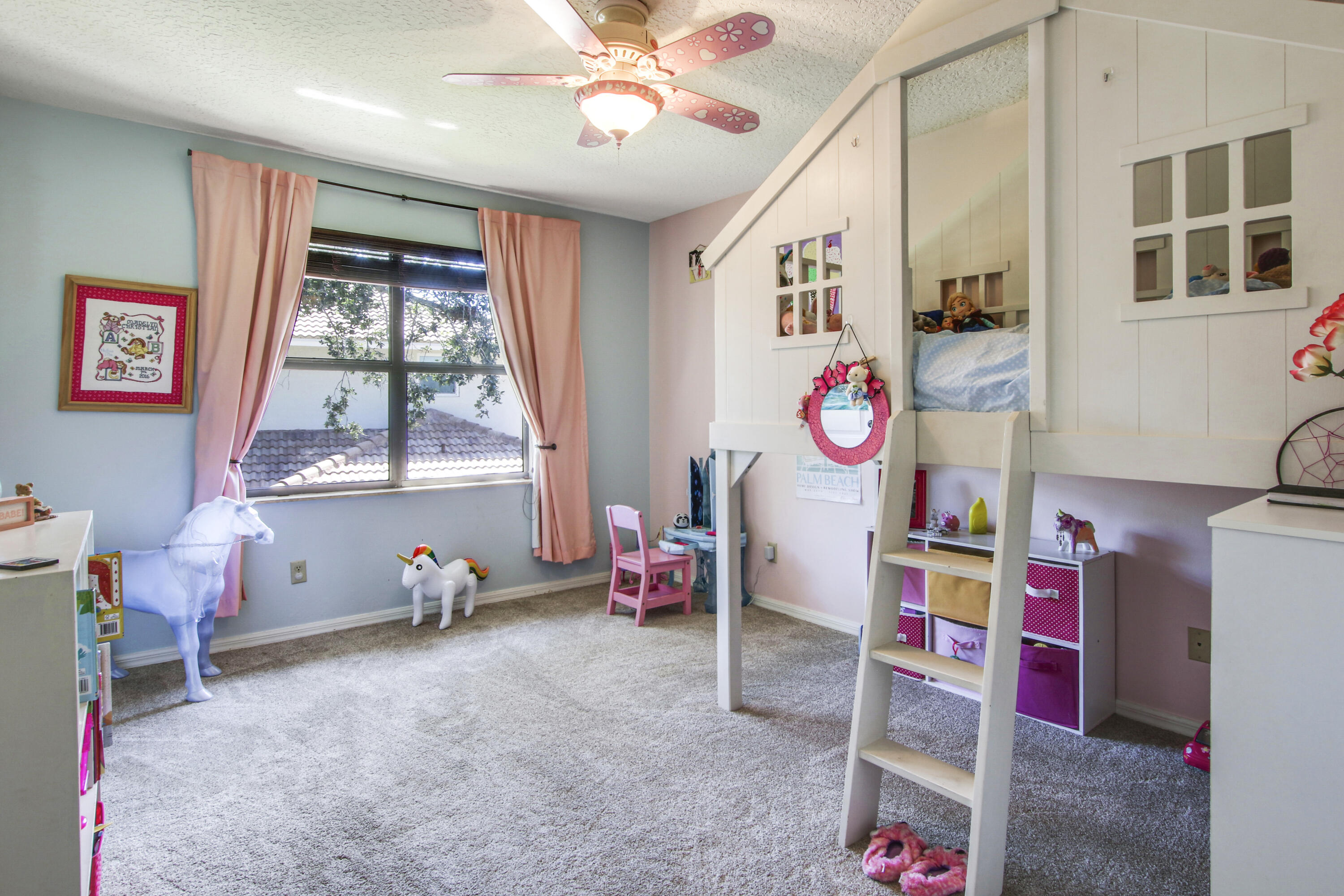 6369 Longleaf Pine Drive Jupiter, FL 33458 - Photo 35 of 53 a room with toys and a window