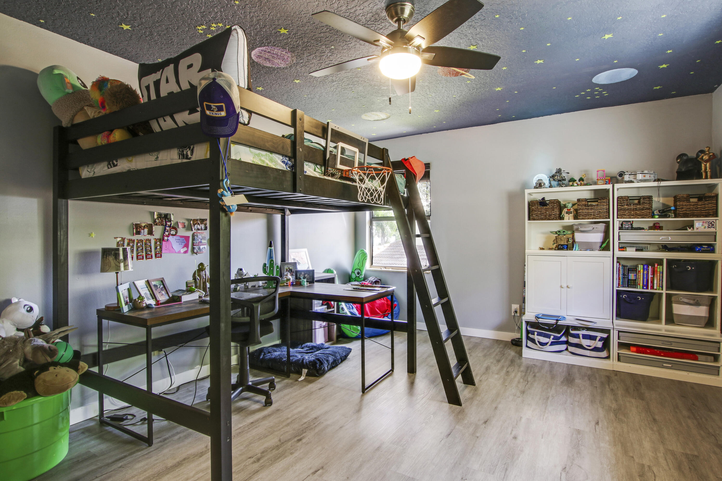 6369 Longleaf Pine Drive Jupiter, FL 33458 - Photo 37 of 53 a living room with lots of furniture and air hockey table