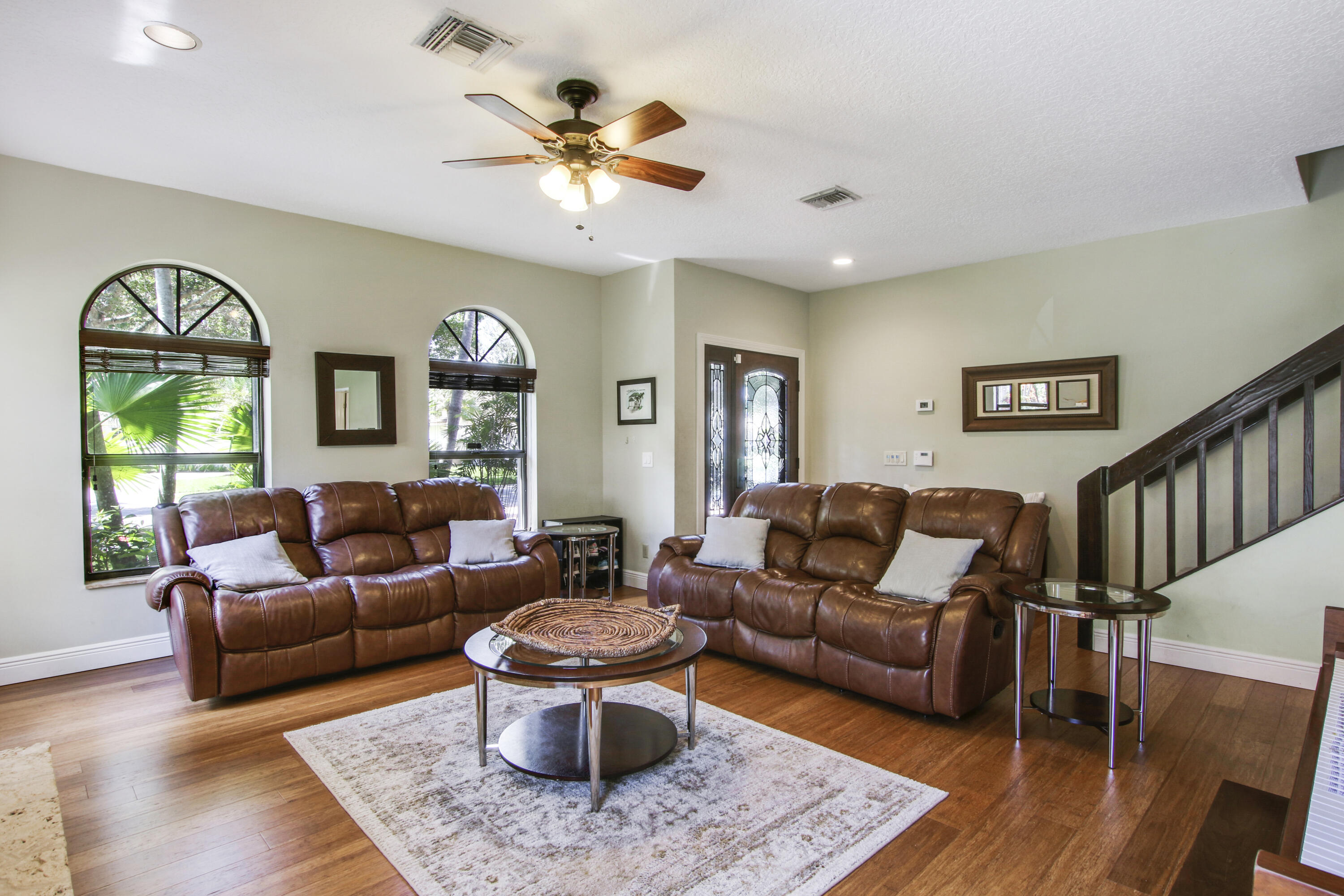 6369 Longleaf Pine Drive Jupiter, FL 33458 - Photo 8 of 53 a living room with furniture and a large window