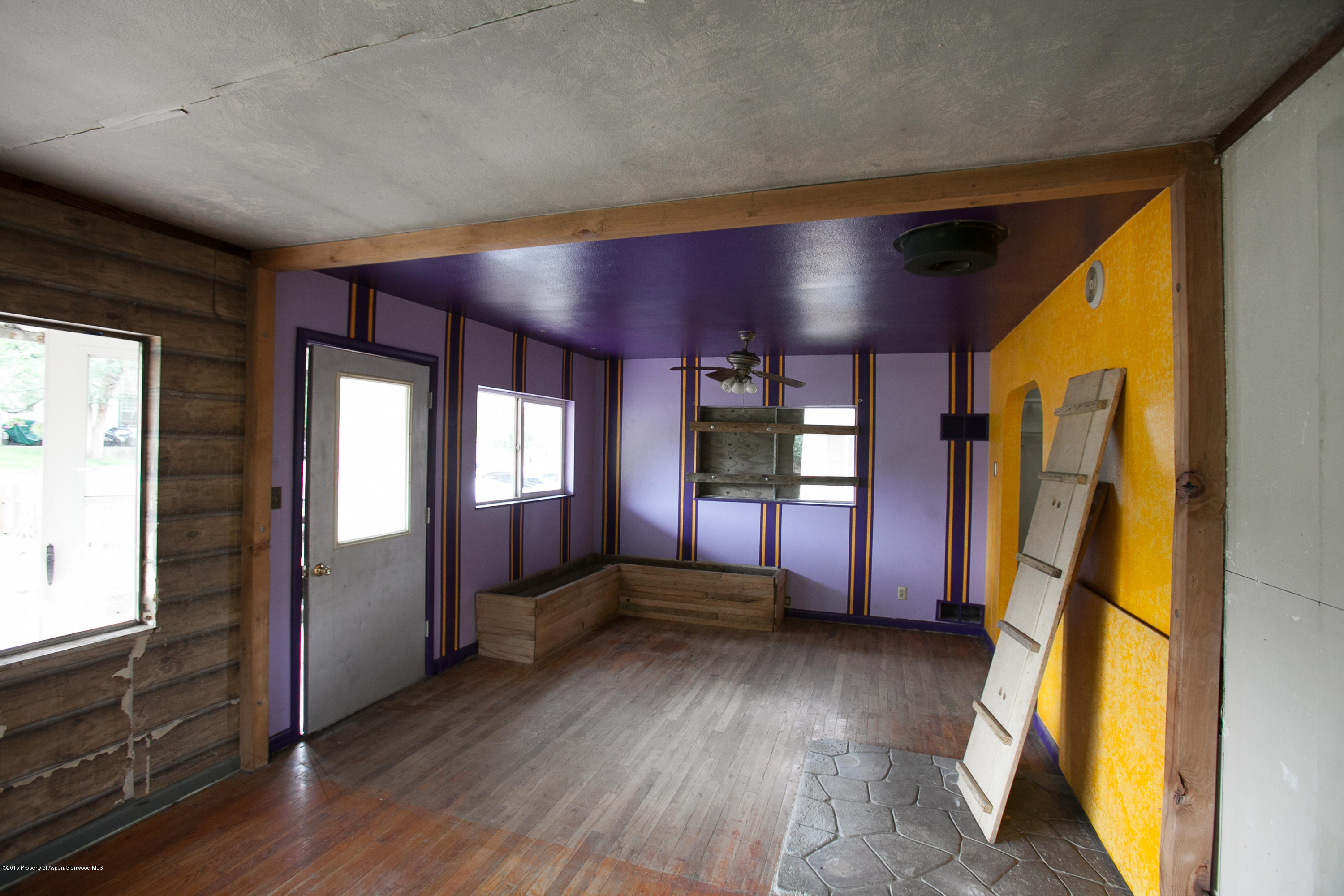 145 June Street Rifle, CO 81650 - Photo 3 of 17 a view of an entryway with a hardwood