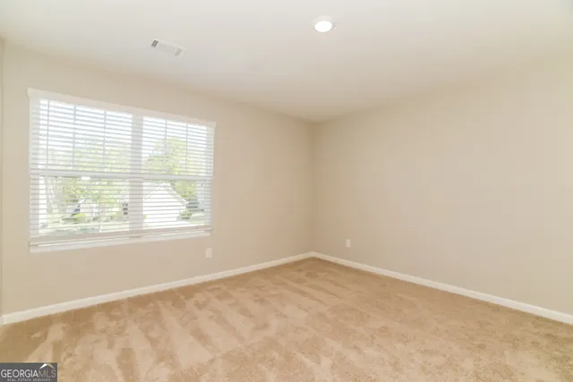 an empty room with a window