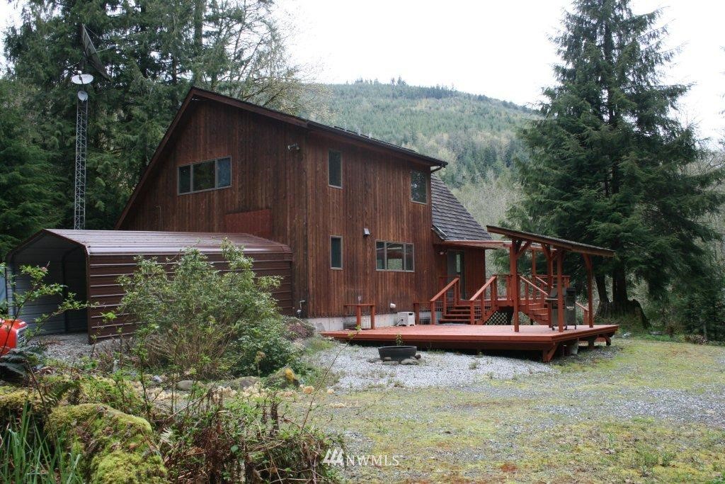 2290 Mosquito Lake Road Deming, WA 98244 - Photo 6 of 15 a view of a small house in the back yard