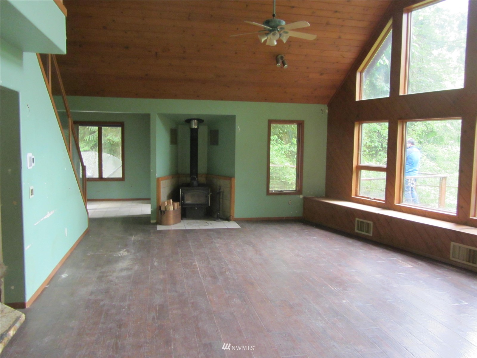 2290 Mosquito Lake Road Deming, WA 98244 - Photo 8 of 15 a view of an empty room with a fireplace and a window
