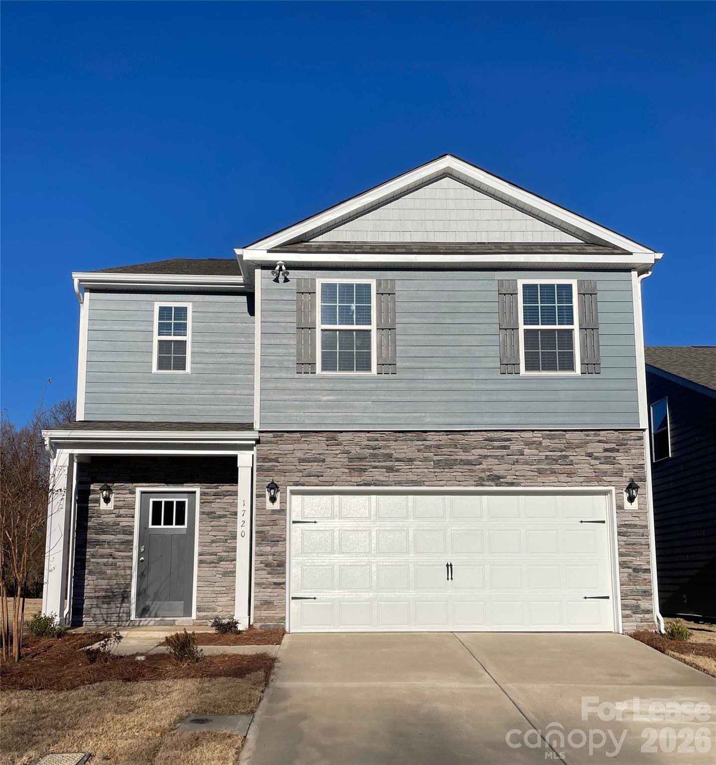 1720 Vanderlyn Street Monroe, NC 28112 - Photo 1 of 33 a front view of a house with a yard
