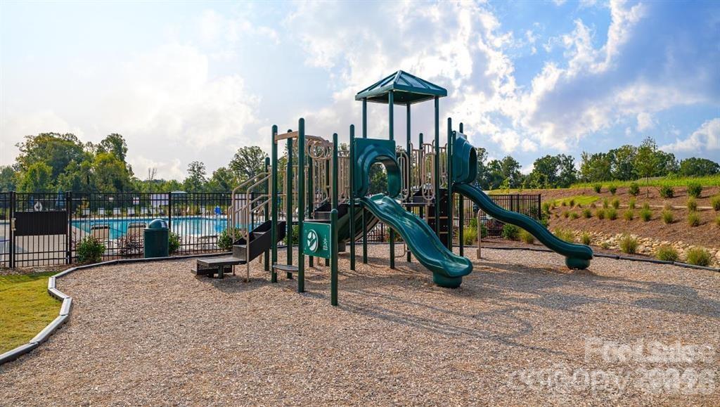 1720 Vanderlyn Street Monroe, NC 28112 - Photo 29 of 33 a view of a park with swings