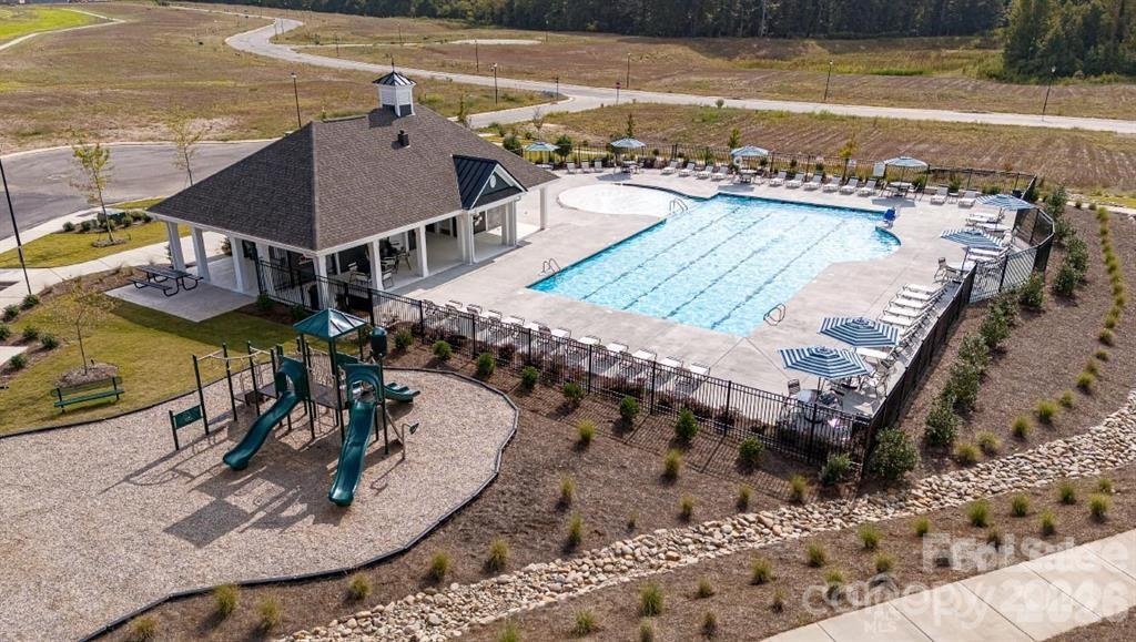 1720 Vanderlyn Street Monroe, NC 28112 - Photo 32 of 33 swimming pool view with a sitting space