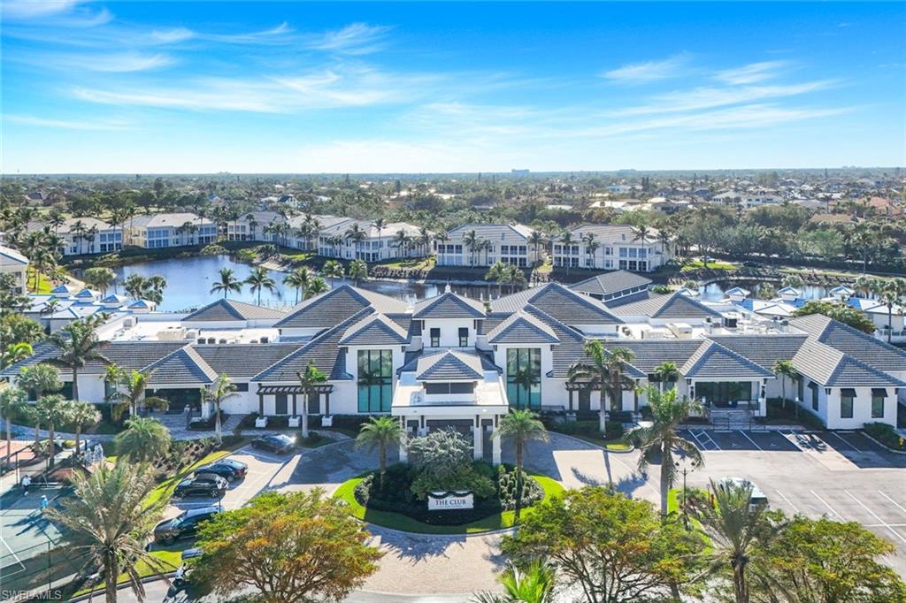 415 Sea Grove Lane, Unit 102 Naples, FL 34110 - Photo 24 of 36 a view of a city in the middle of a city